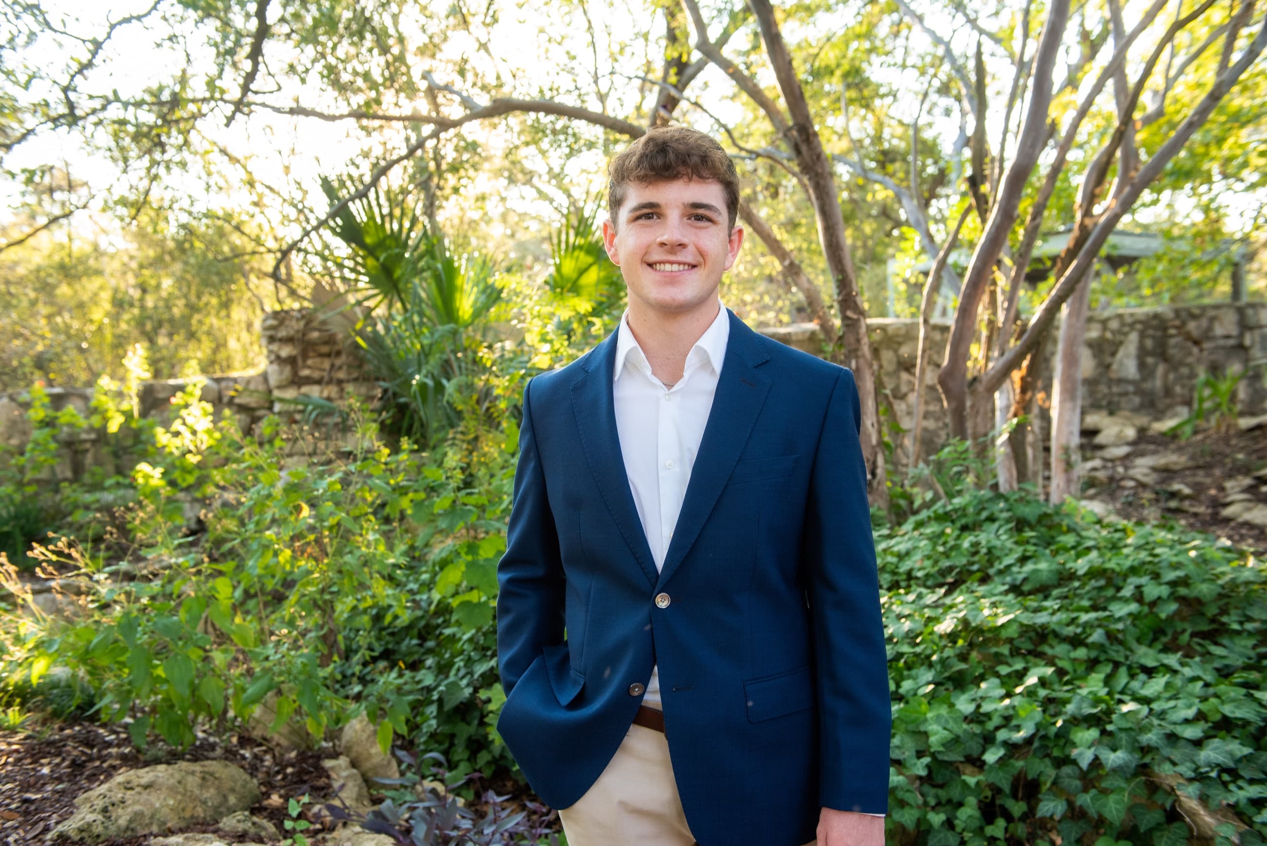Charlie Hubbard, Carnegie Mellon University student, outdoors in a navy blazer